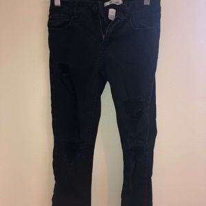 Refuge black jeans! With small rips near the knee